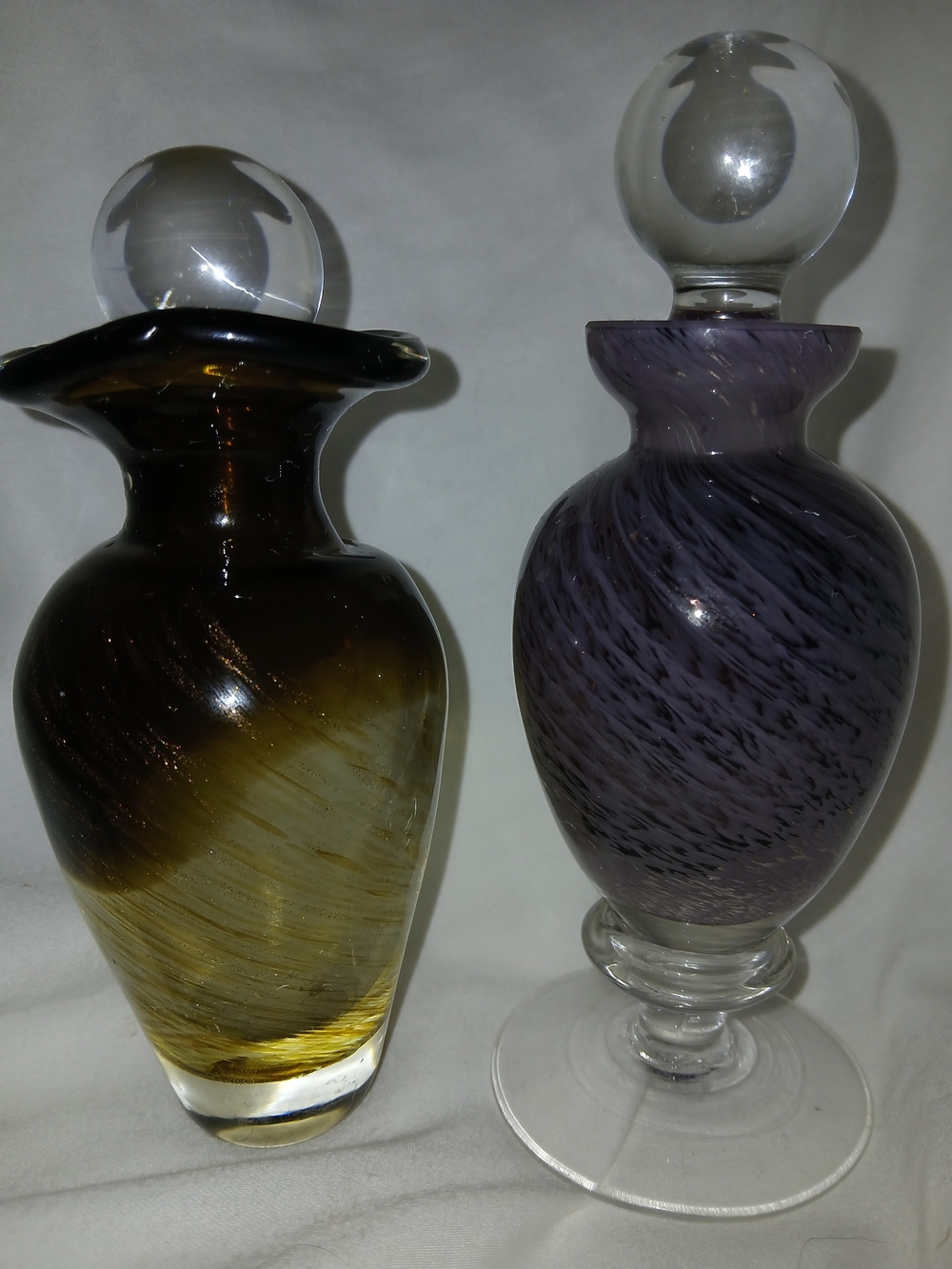 Amber and Purple Glass Perfume Bottles with Clear Orb Stoppers